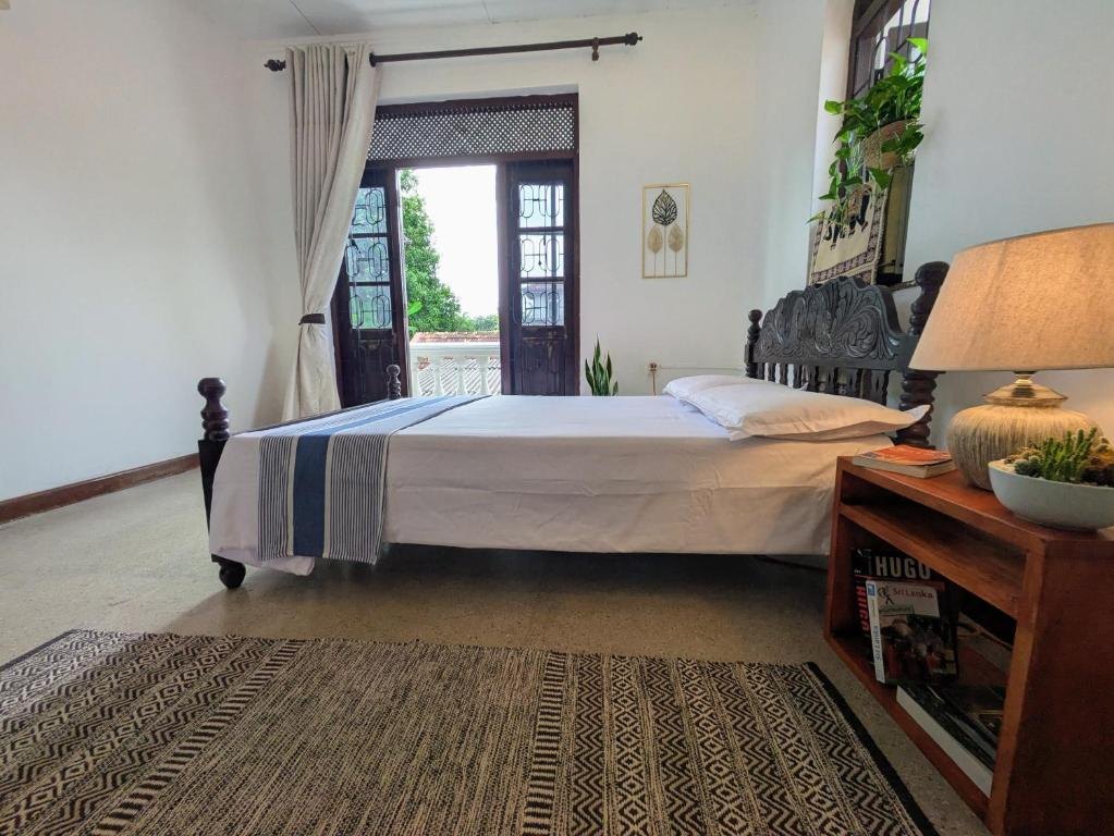 Bright AC guest room at Airport Gateway Residence